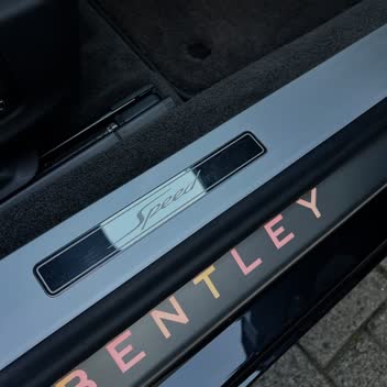 An illuminated Bentley door sill after cleaning.