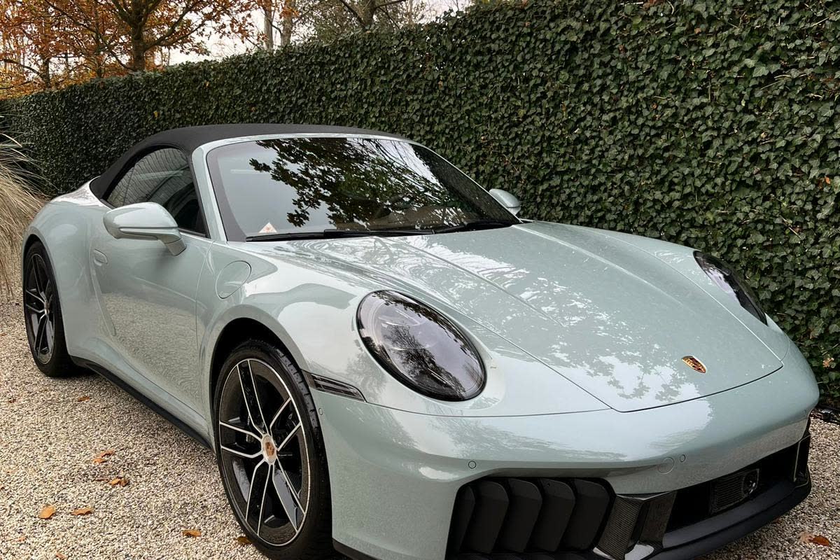 A Porsche 911 Targa detailed on a private driveway.